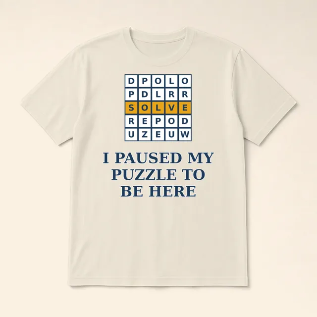 I Paused My Puzzle to Be Here design shown on a t-shirt