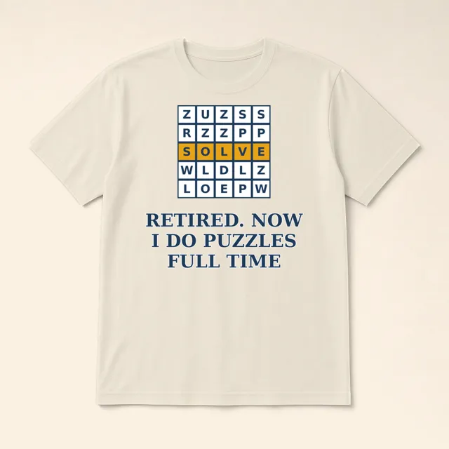 Retired. Now I Do Puzzles Full Time design shown on a t-shirt